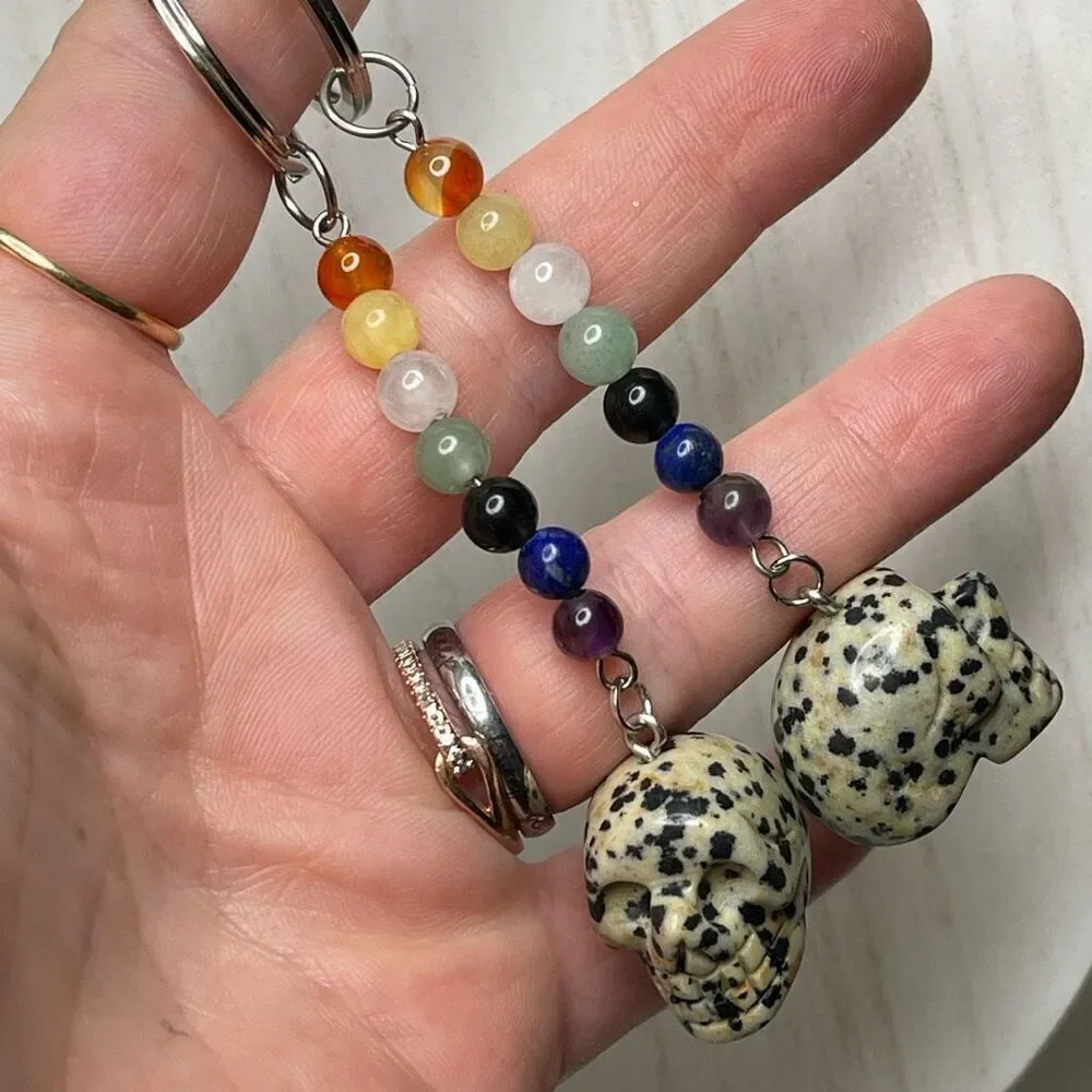 Dalmatian jasper skull carving key chain key ring 7 chakra beads rainbow